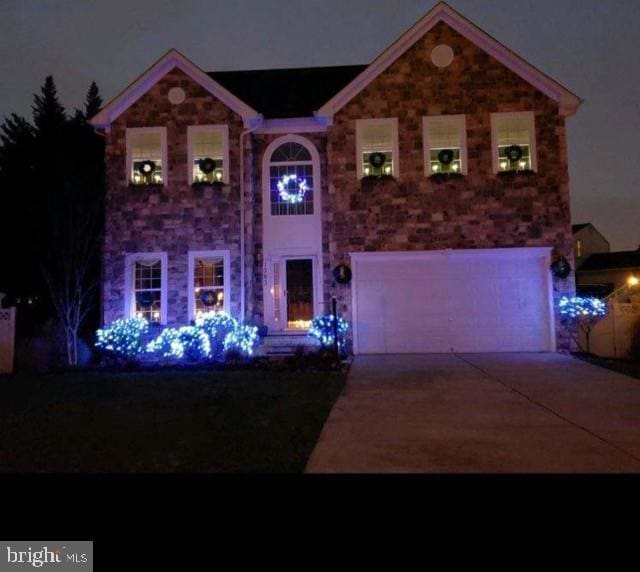 view of front of home with a garage