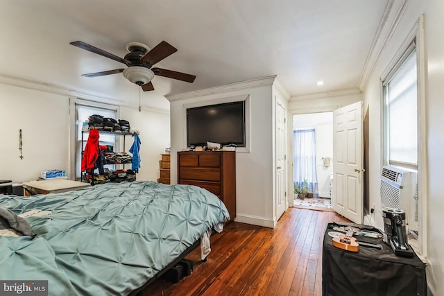 bedroom with ceiling fan, dark hardwood / wood-style flooring, and crown molding