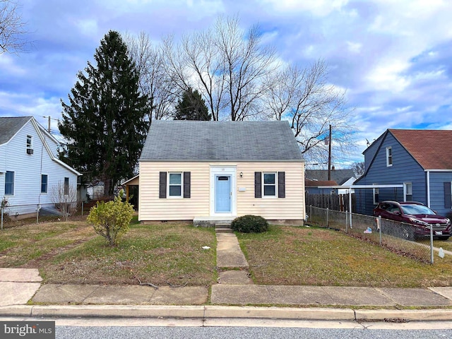 bungalow with a front lawn