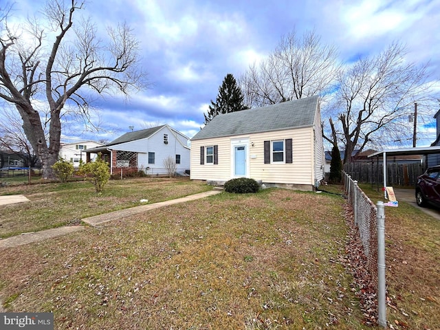 view of front of home featuring a front lawn