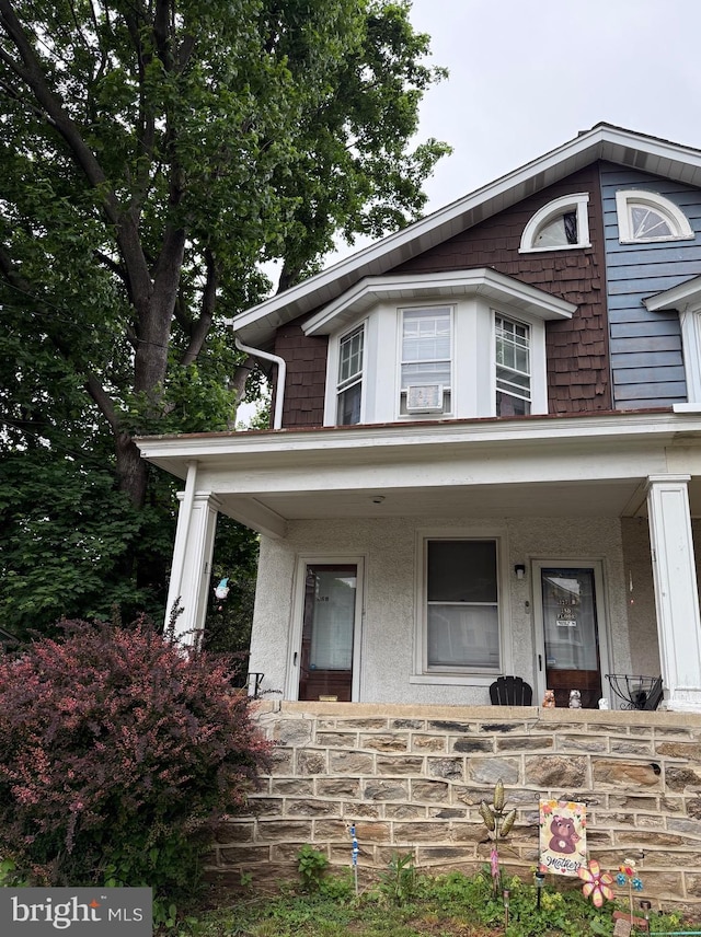 327 Jefferson Ave, Cheltenham, PA 19012 - view of front of property featuring covered porch, stucco siding, and stone siding