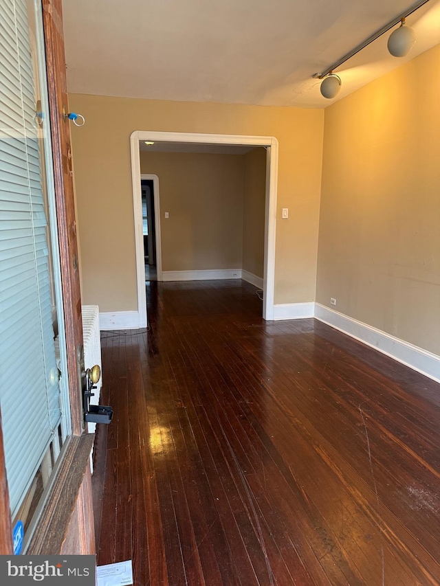 327 Jefferson Ave, Cheltenham, PA 19012 - empty room with baseboards and hardwood / wood-style floors