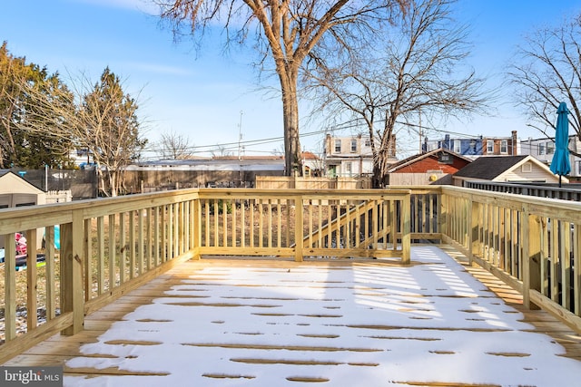 view of snow covered deck