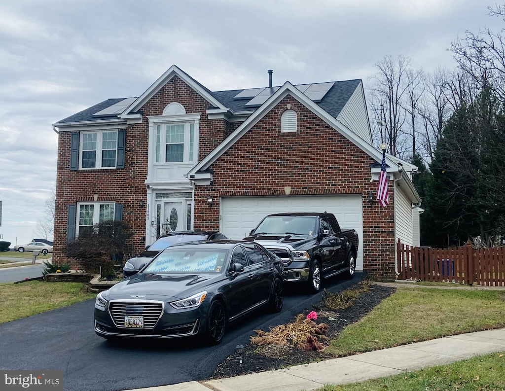 front of property featuring solar panels