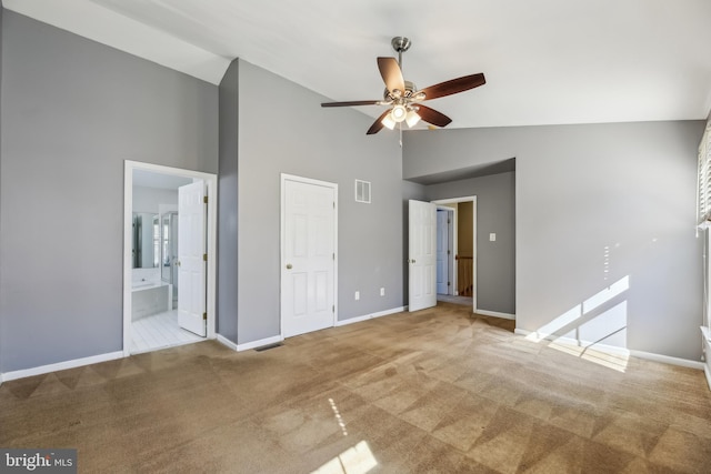 unfurnished bedroom with baseboards, visible vents, carpet flooring, and ensuite bathroom