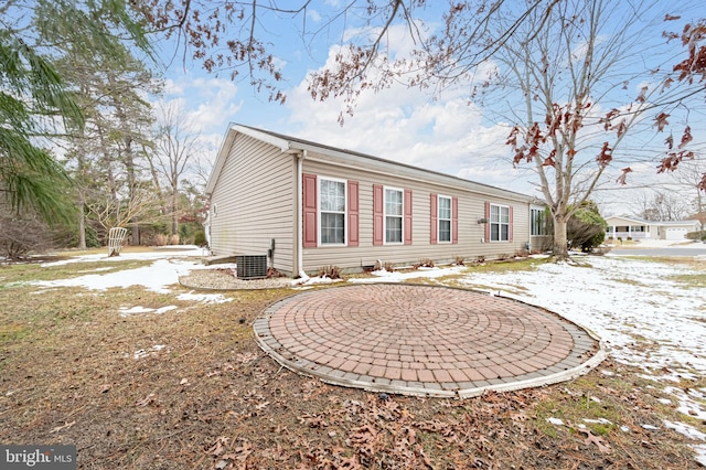 view of property exterior featuring central AC