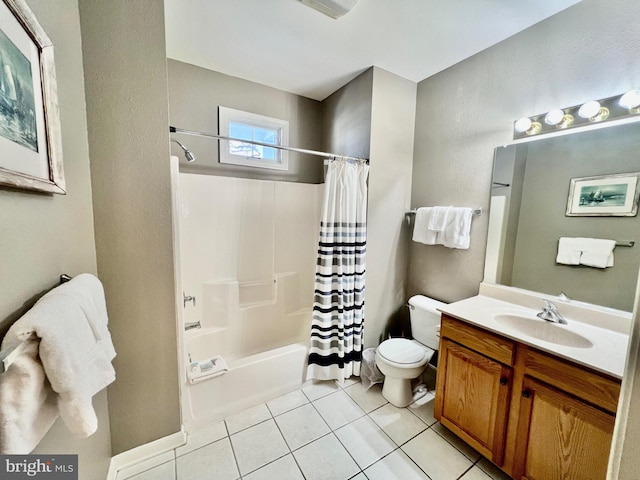 full bathroom featuring tile patterned flooring, vanity, toilet, and shower / tub combo