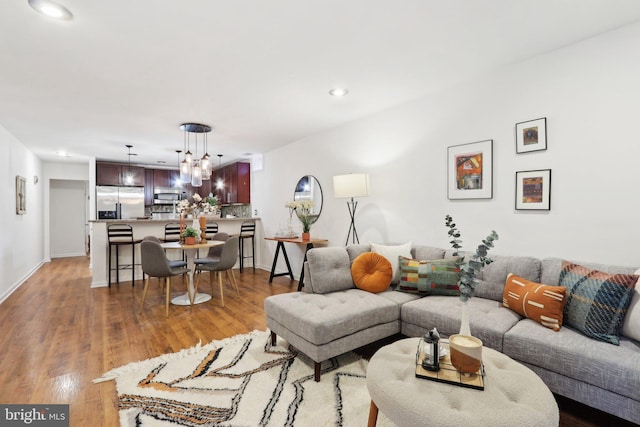 living room with light hardwood / wood-style floors