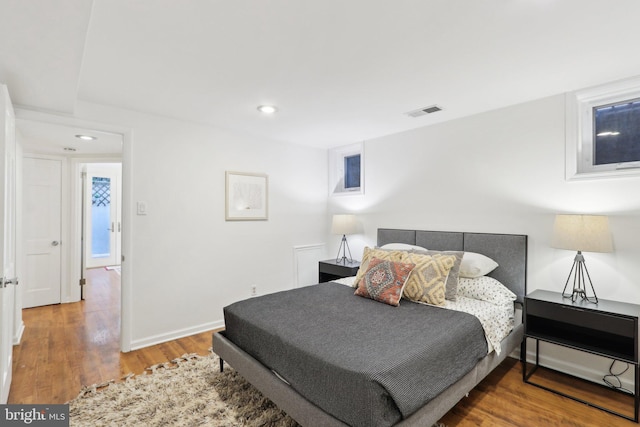 bedroom featuring hardwood / wood-style floors