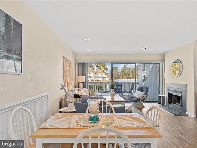 dining space with light wood-type flooring