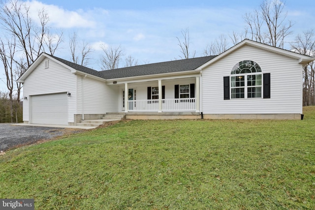 single story home with a garage, covered porch, and a front yard