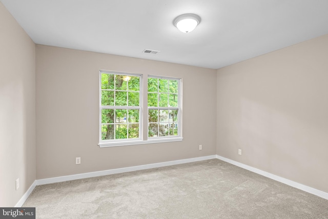 view of carpeted spare room