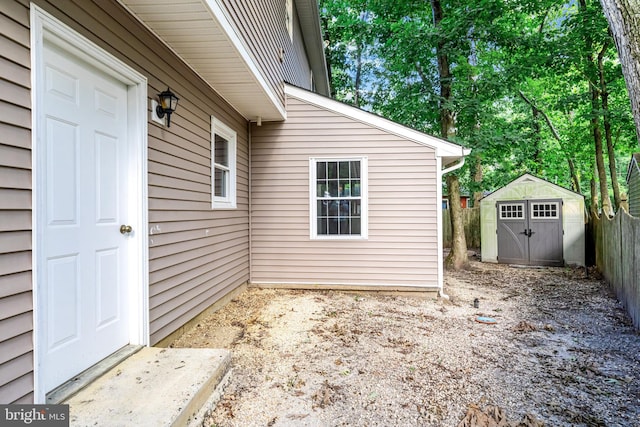 view of patio / terrace featuring a shed