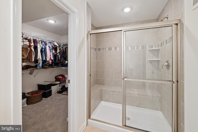 bathroom featuring an enclosed shower