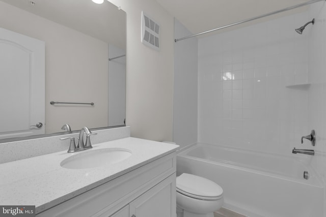 full bathroom with toilet, vanity, and shower / tub combination