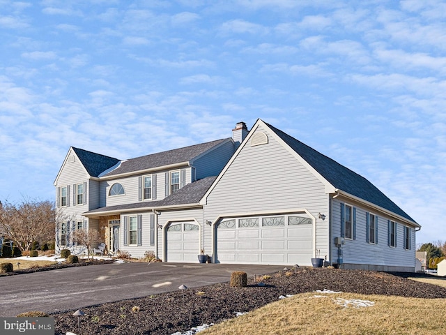 view of property featuring a garage