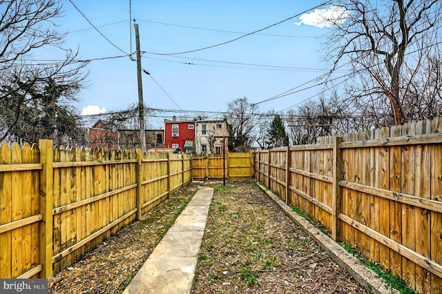 view of yard featuring a fenced backyard