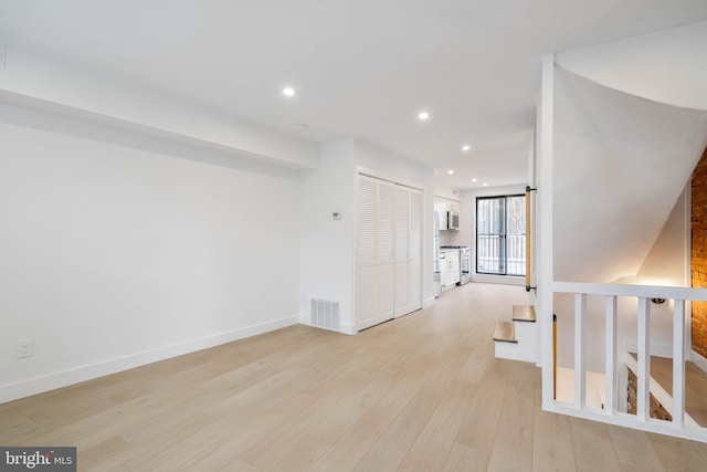 interior space with light hardwood / wood-style flooring