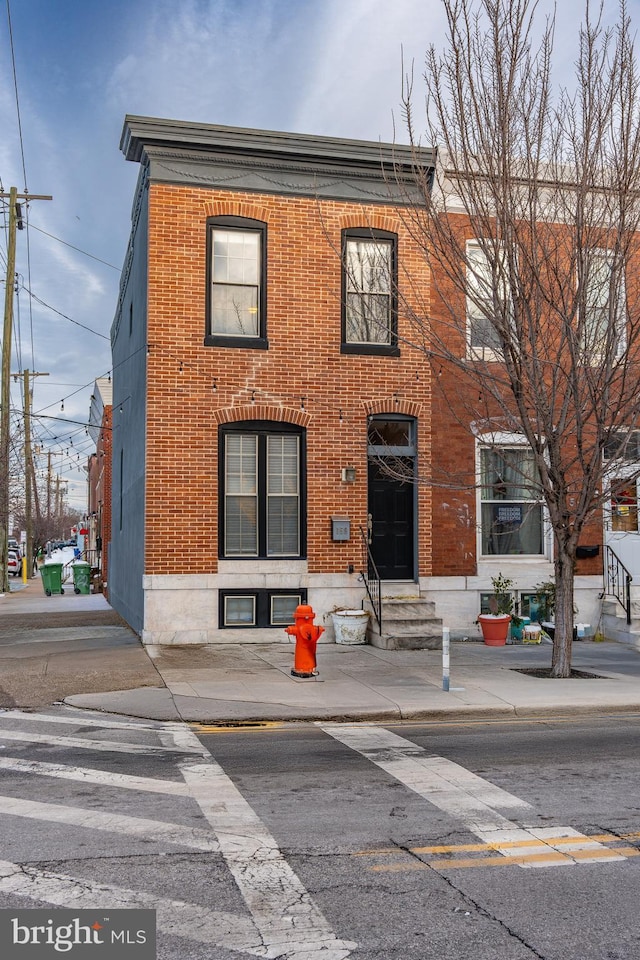 159 N Ellwood Ave, Baltimore, MD 21224 - view of front of house featuring brick siding and entry steps