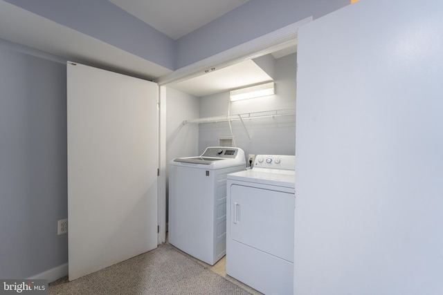 159 N Ellwood Ave, Baltimore, MD 21224 - washroom with laundry area and washer and clothes dryer