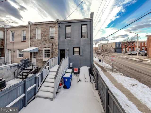 159 N Ellwood Ave, Baltimore, MD 21224 - view of front of property with central air condition unit and stone siding