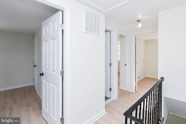 hallway featuring light hardwood / wood-style floors