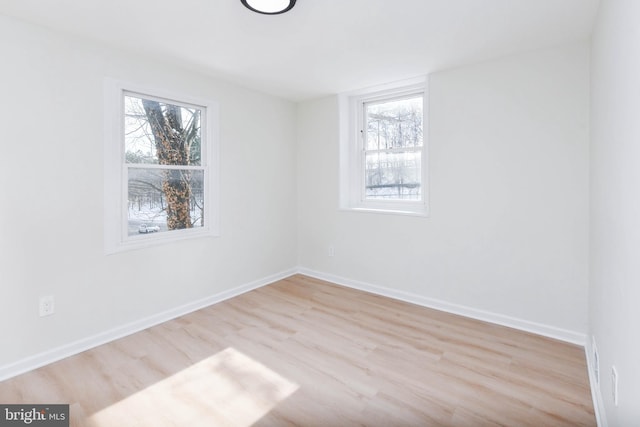 empty room featuring light hardwood / wood-style floors