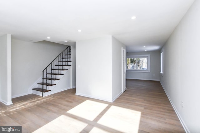 spare room featuring light wood-type flooring