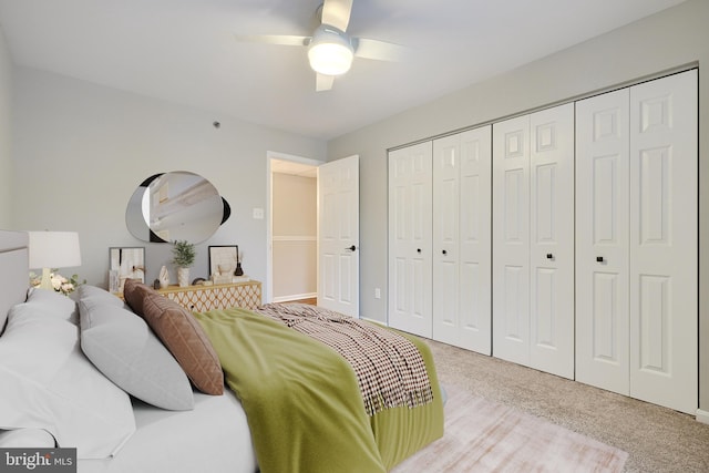 bedroom with carpet flooring, a closet, and ceiling fan