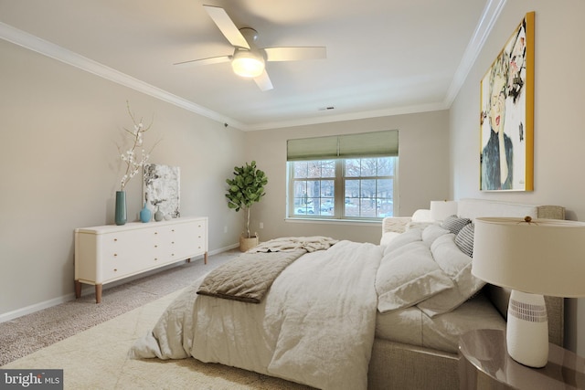 bedroom featuring ceiling fan, crown molding, and carpet