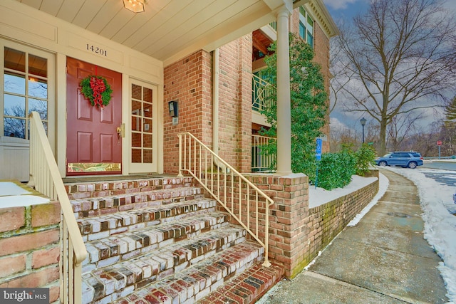 doorway to property featuring a porch