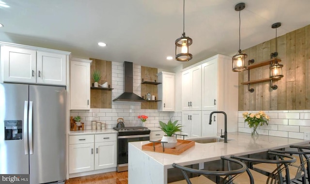 kitchen featuring stainless steel appliances, open shelves, and white cabinets