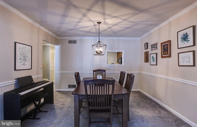 dining area featuring crown molding, a chandelier, and dark carpet