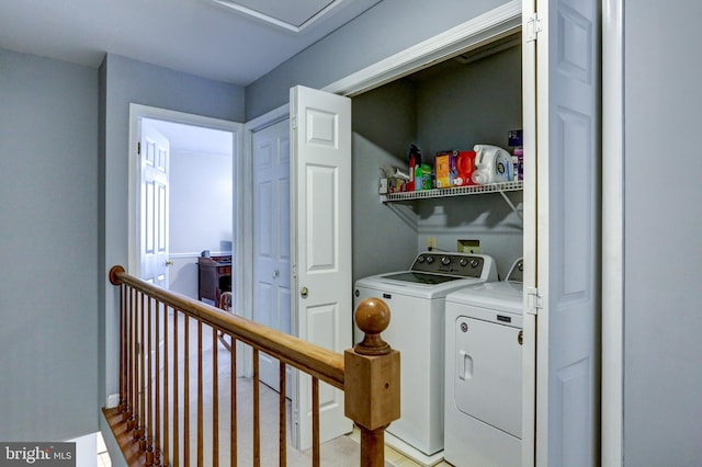 laundry room featuring washer and clothes dryer