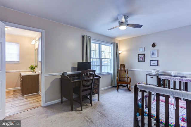 carpeted bedroom with ceiling fan