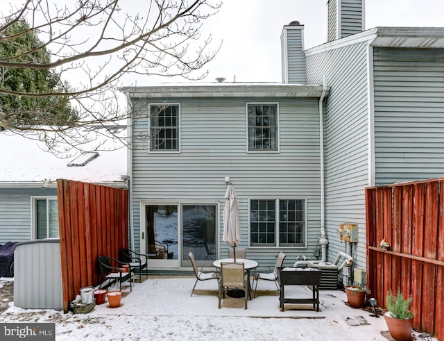 view of snow covered house