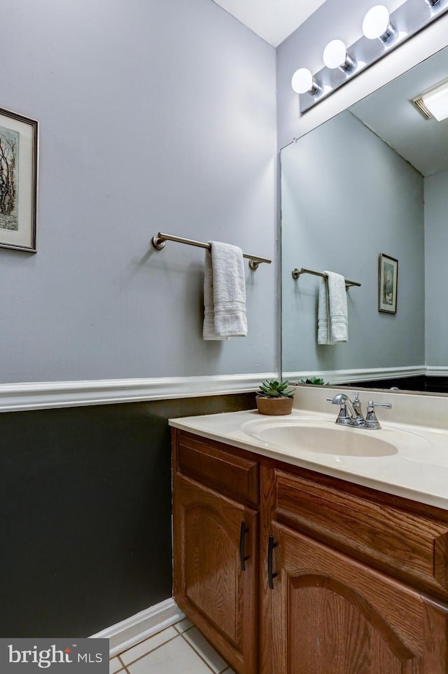 bathroom featuring tile patterned floors and vanity