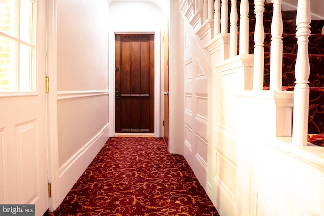 hallway with carpet