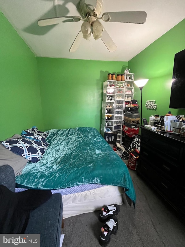 bedroom with ceiling fan and carpet flooring