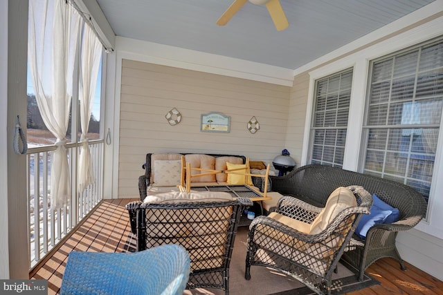 sunroom / solarium with ceiling fan