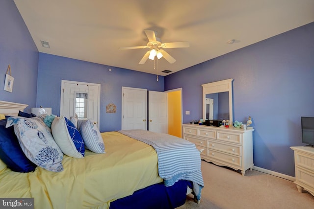 carpeted bedroom featuring ceiling fan