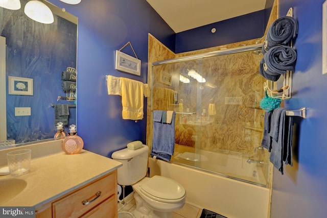 full bathroom featuring toilet, tile patterned flooring, vanity, and combined bath / shower with glass door