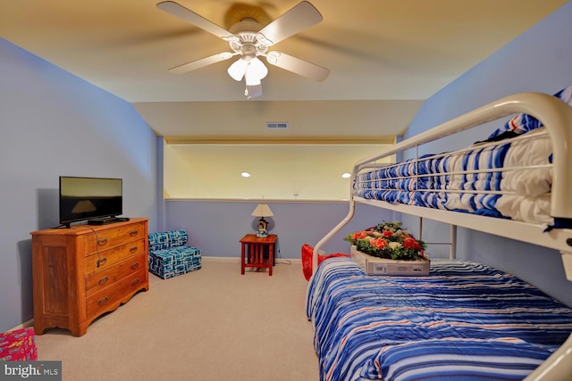 bedroom featuring ceiling fan, carpet floors, and lofted ceiling