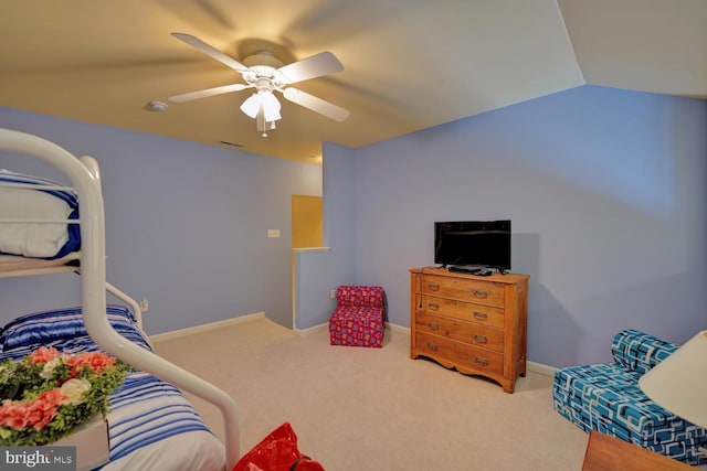 bedroom featuring carpet, ceiling fan, and lofted ceiling