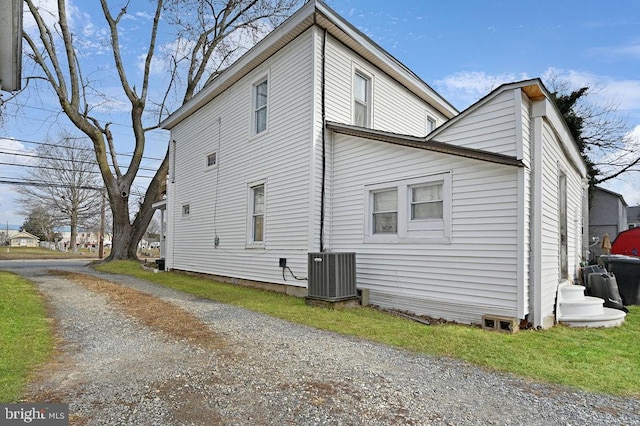 view of home's exterior featuring cooling unit