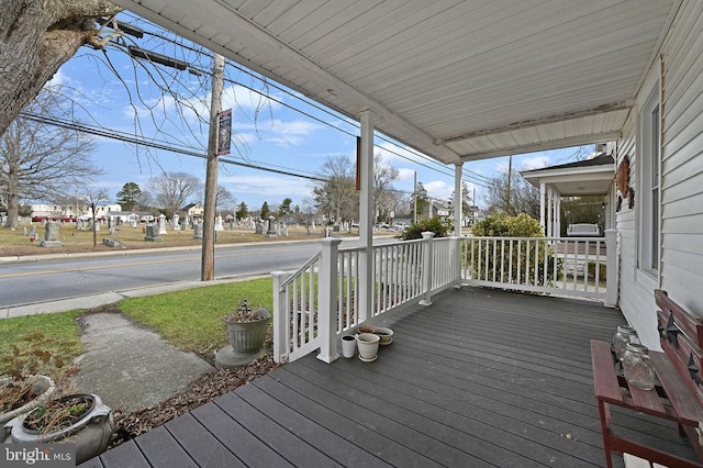 wooden deck with a porch