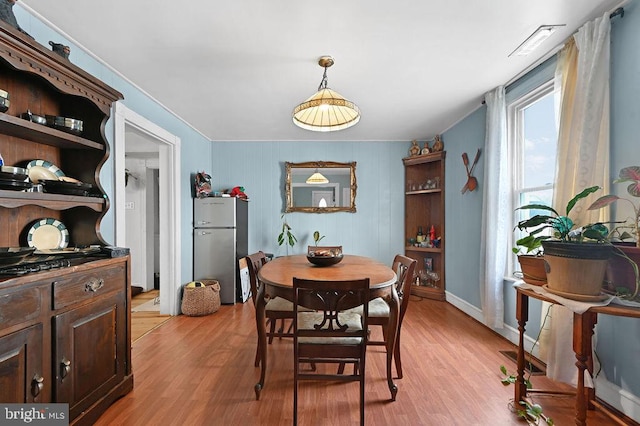 dining area featuring light hardwood / wood-style floors