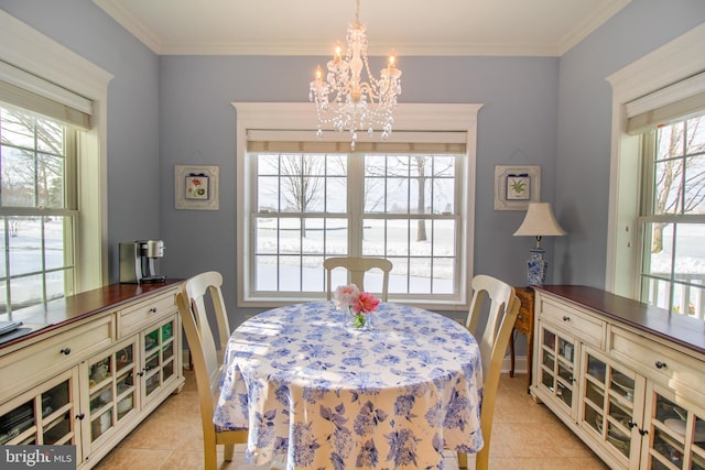 tiled dining room featuring ornamental molding and a notable chandelier