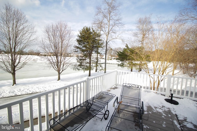 view of snow covered deck