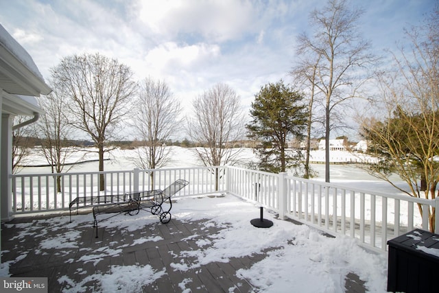 view of snow covered deck